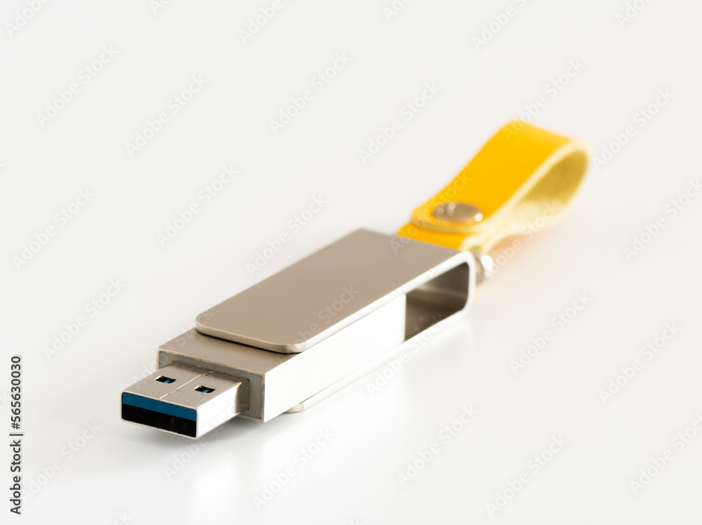 Silver usb flash memory on the white background. Silver usb flash memory on the white background.