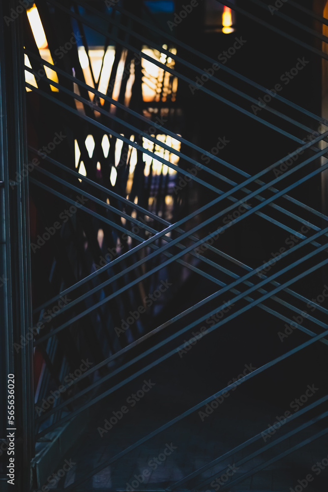 Naklejka premium Background, geometric metal lines in the evening atmosphere