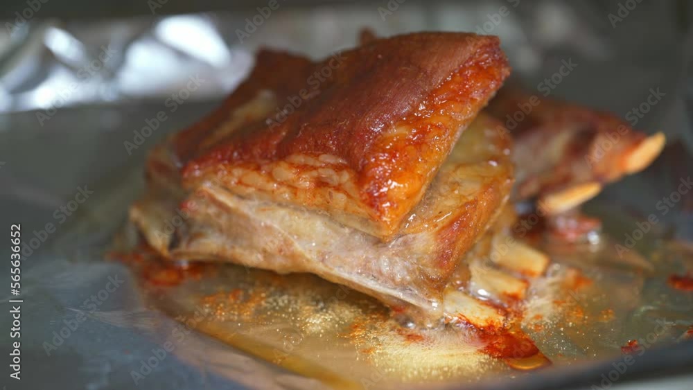 A golden and tempting crispy grilled lamb chop cooking in the oven A golden and tempting crispy grilled lamb chop cooking in the oven