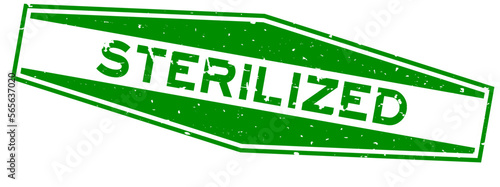 Grunge green sterilized word hexagon rubber seal stamp on white background
