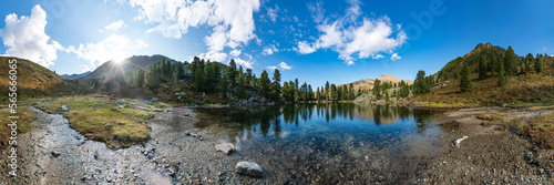 Mountains, peaks, lake, everlasting ice and trees landscape. Knapenweg natural environment. Hiking in the alps, Tirol, Austria, Europe