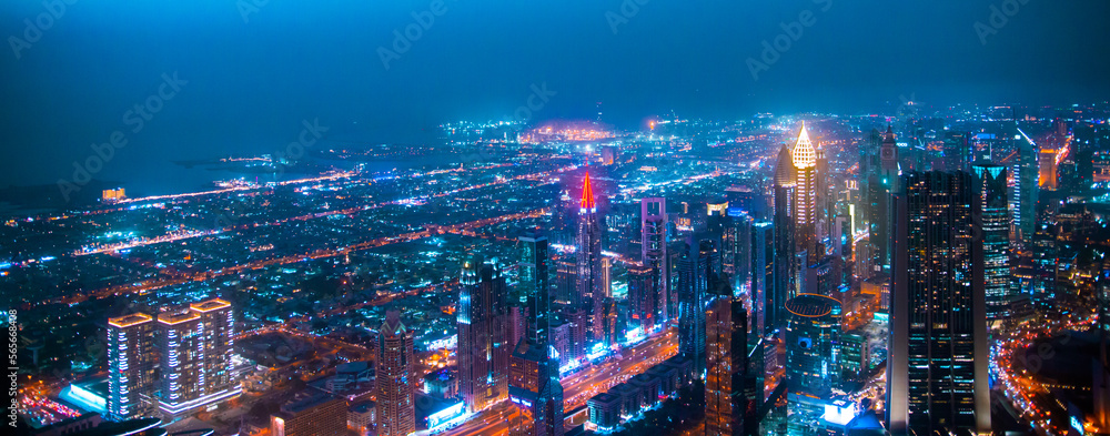 Dubai, UAE. Dubai city at night, view with lit up skyscrapers and roads. Dubai, UAE. Dubai city at night, view with lit up skyscrapers and roads.