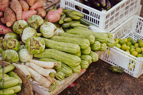 Fresh vegetables on display in a traditional market