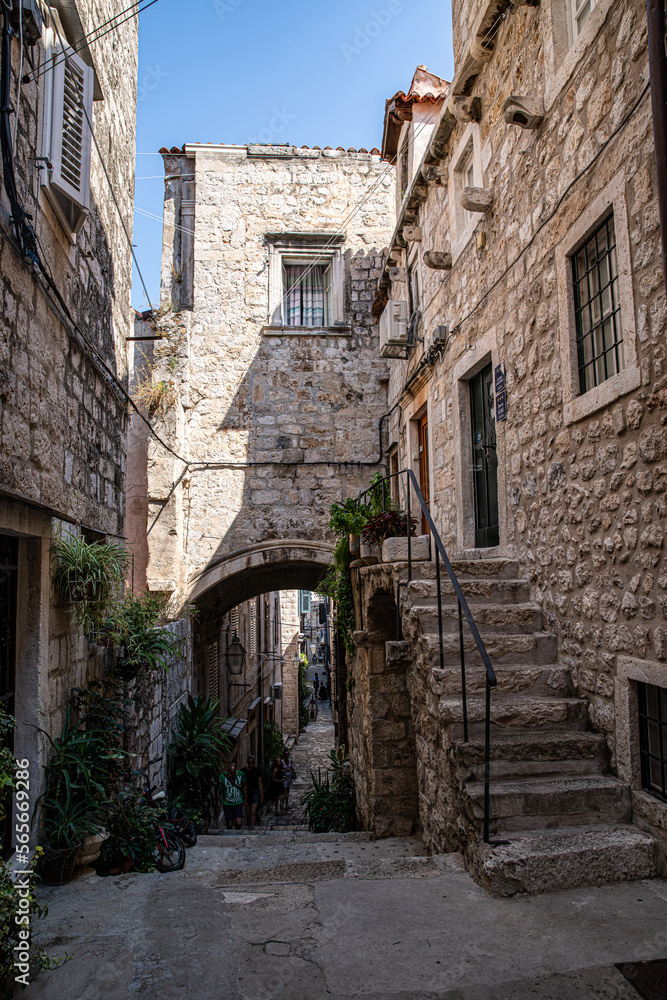 Morning on narrow street of Mediterranean town.