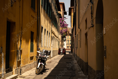 Street view of a classic Italian narrow alley in Pisa  Italy