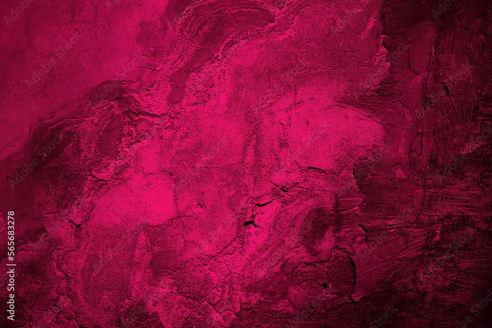 Black red rough surface. Toned old concrete wall.  Viva magenta color. Trend 2023. Close-up. Grunge background for design. Distressed, cracked, broken, crumbled, damaged, dilapidated. Backdrop.