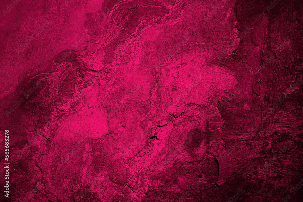 Black red rough surface. Toned old concrete wall. Viva magenta color. Trend 2023. Close-up. Grunge background for design. Distressed, cracked, broken, crumbled, damaged, dilapidated. Backdrop.