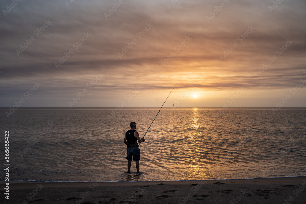 Pescador en el amanecer