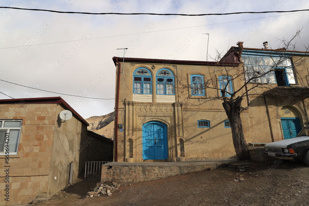Bright elements in old houses in the mountain village of Chokh in Dagestan: walls, roofs, doors and window frames. Bright elements in old houses in the mountain village of Chokh in Dagestan: walls, roofs, doors and window frames.