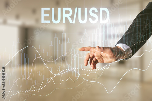 Double exposure of male hand clicks on abstract virtual EURO USD forex chart hologram on blurred office background. Banking and investing concept