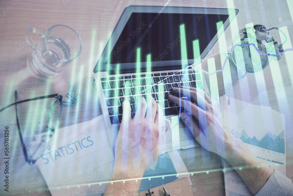 Multi exposure of forex graph with man working on computer on background. Concept of market analysis. Multi exposure of forex graph with man working on computer on background. Concept of market analysis.