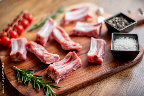 raw pork ribs on wooden background