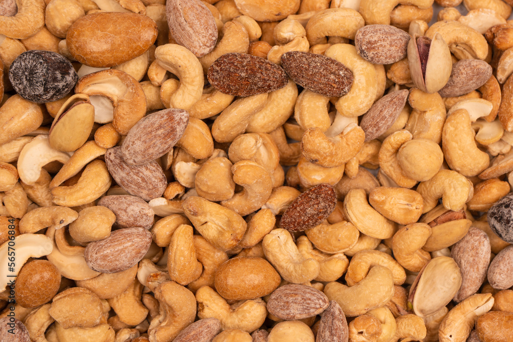 A group of almonds, pistachios, walnuts, macadamia, cashews. A group of almonds, pistachios, walnuts, macadamia, cashews.