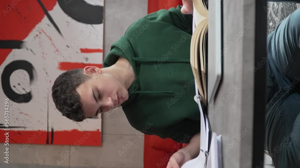 Young man caucasian teenager read book study at home education concept Young man caucasian teenager read book study at home education concept