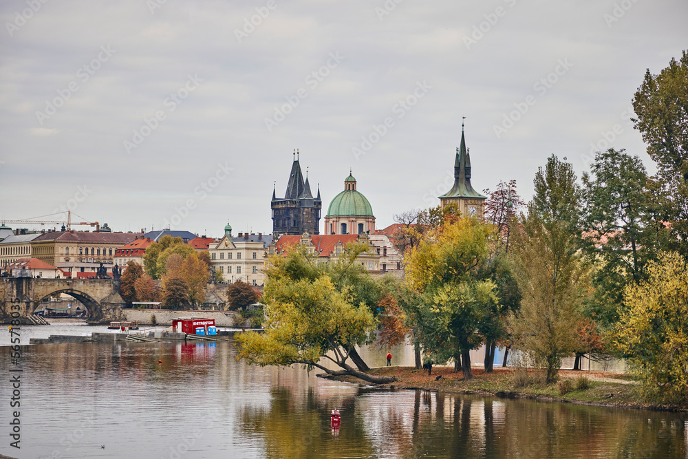 View of Bedrich Smetana Museum and trees next to the Vltava in Prague, Czech.