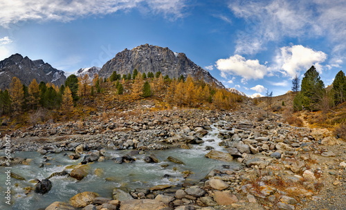 Russia. The South of Western Siberia, the Altai Mountains. Autumn view of the valley of the Aktru River, the source of which is located at the foot of the glacier on the North Chui mountain range.