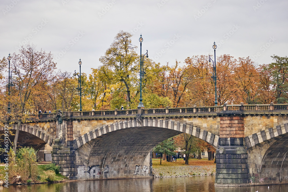 Fototapeta premium Stone old bridge above the Vltava river in Prague.
