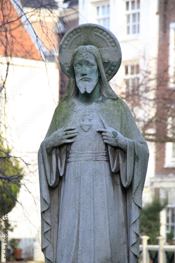  Statue of Standing Christ at the Begijnhof Courtyard in Amsterdam, Netherlands