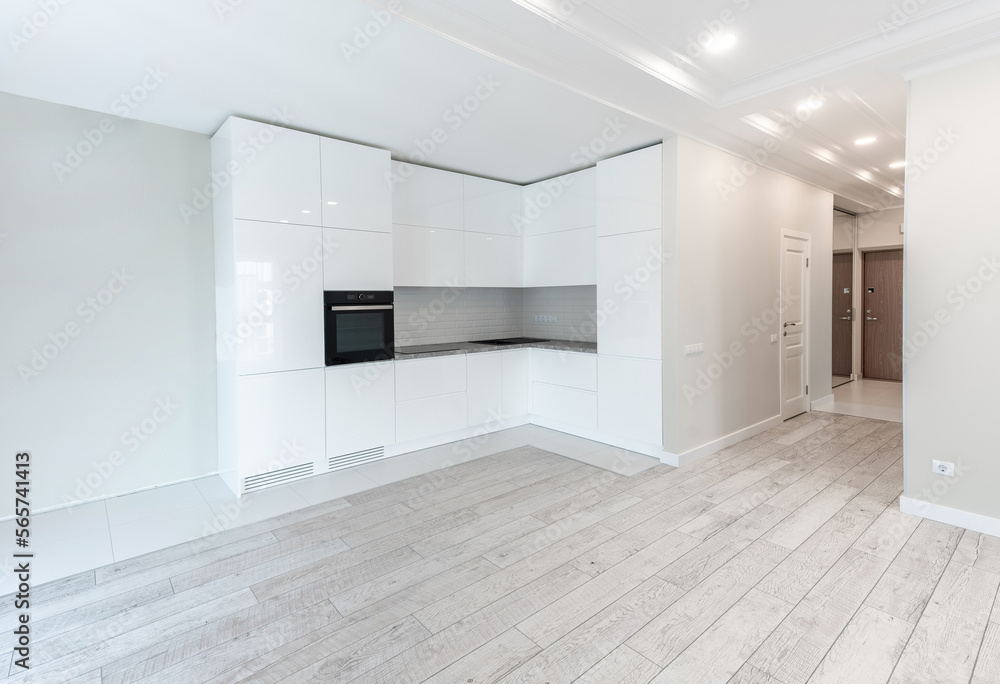 Obraz premium Interior of Living room with kitchen and empty space. Bright White Walls and Ceiling.