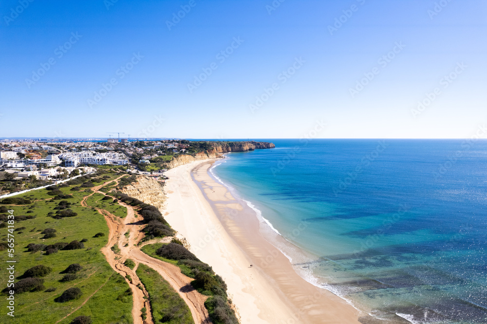 Algarve Region Portugal. Lagos looking over to Praia Da Luz Beach. Beautiful Blue Skies Algarve Region Portugal. Lagos looking over to Praia Da Luz Beach. Beautiful Blue Skies