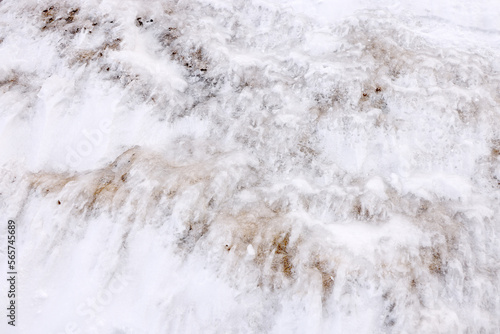 Ice frost on stone texture. Winter abstract background. Snow surface