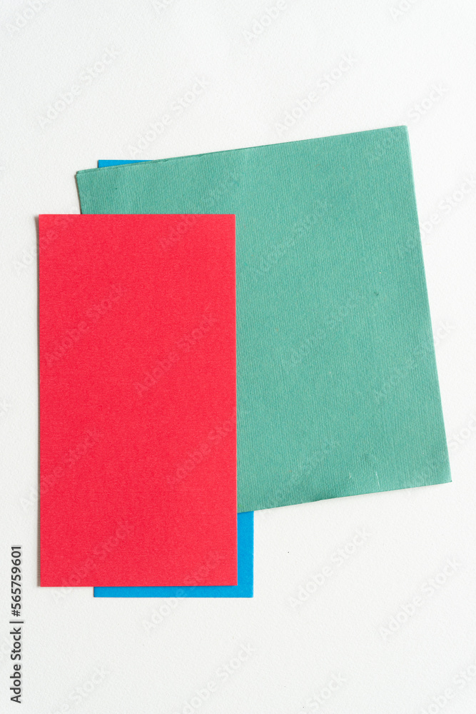 red, green, and a touch of blue paper backdrops on blank paper red, green, and a touch of blue paper backdrops on blank paper