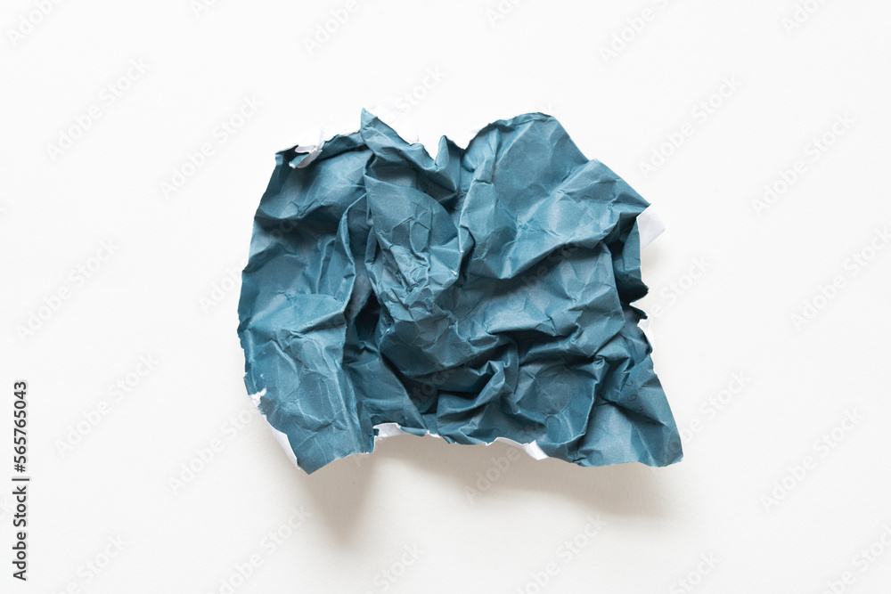 crumpled rough blue paper ball