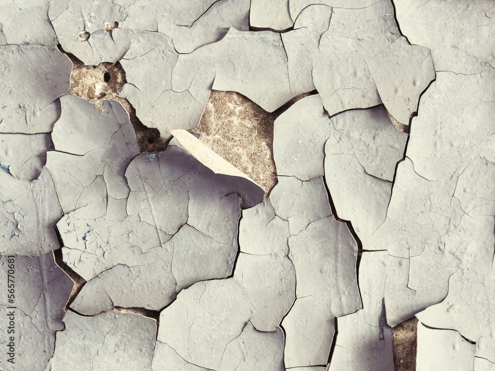Foto de Peeling paint on the wall. Old concrete wall with cracked