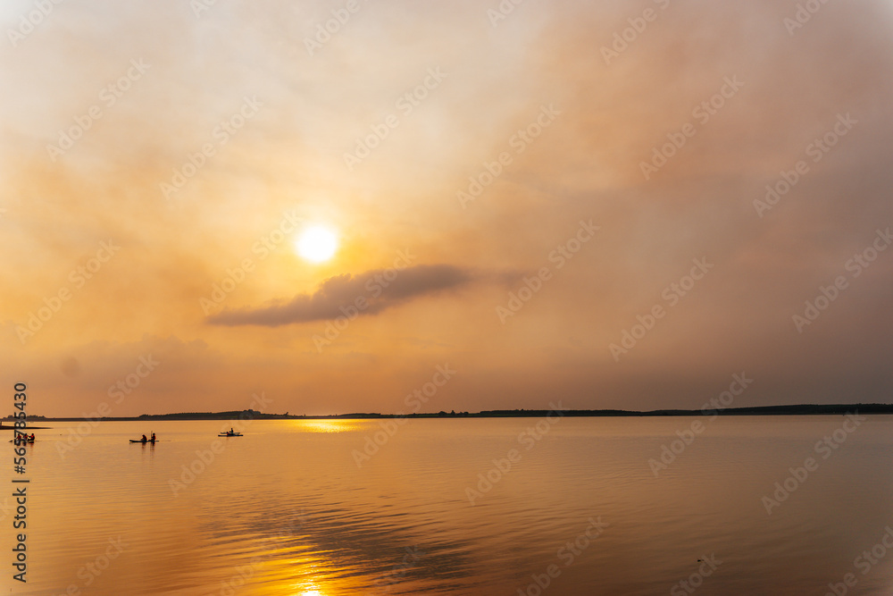 Fototapeta premium sunset over the lake