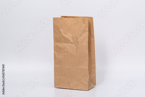 a brown paper bag on a white background