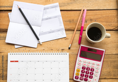 Obraz na plátně passbook bank, statement, calendar and calculator for business work arrangement