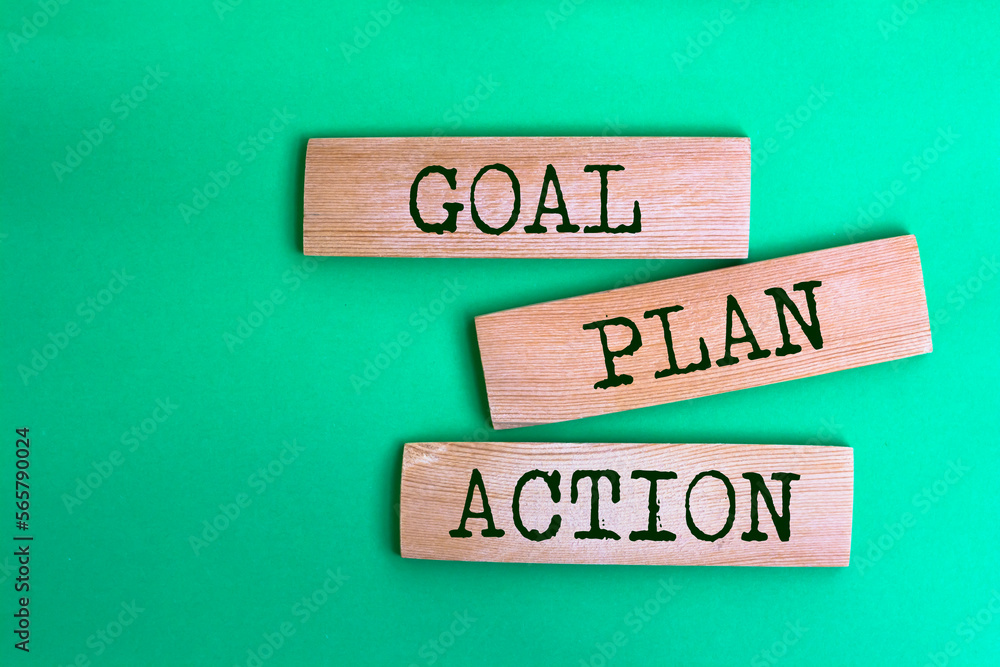 Wooden blocks with words 'Goal Plan Action'. Wooden blocks with words 'Goal Plan Action'.
