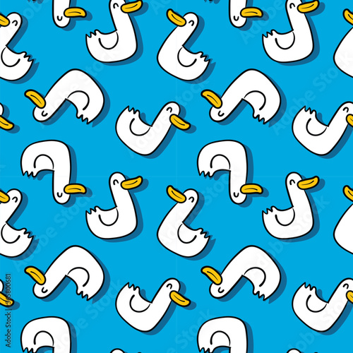 Seamless Pattern with Cartoon Duck Design on Blue Background