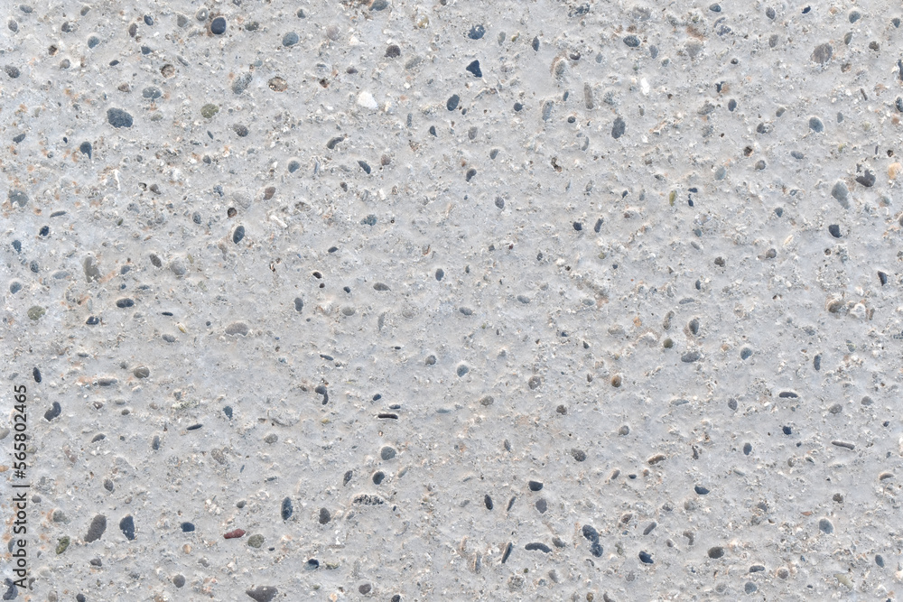Gray and white concrete mixed with small gravel stones floor texture background. Gray and white concrete mixed with small gravel stones floor texture background.