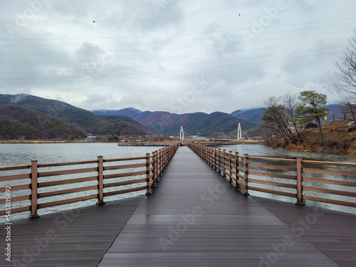 wooden bridge over the lake © Kang Sunghee