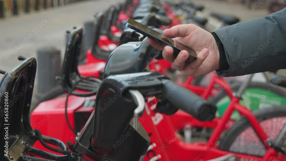 custom made wallpaper toronto digitalClose-up shot of tourist confirming payment method for using city bicycle. Detailed view of male commuter signing up for renting a bike to explore surroundings. High quality 4k footage