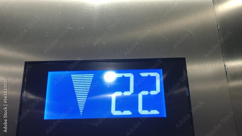 Digital numbers of elevators from 19 to 24, white color on blue. Elevator digits. Moder elevator indicator in the house. New year concept Digital numbers of elevators from 19 to 24, white color on blue. Elevator digits. Moder elevator indicator in the house. New year concept