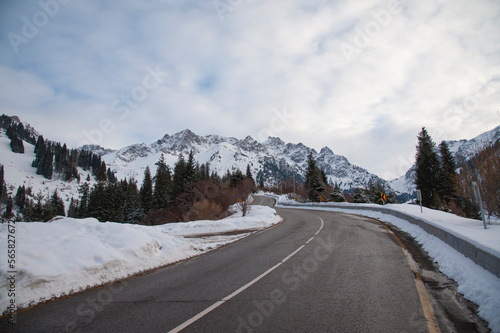empty road against the backdrop of mountains