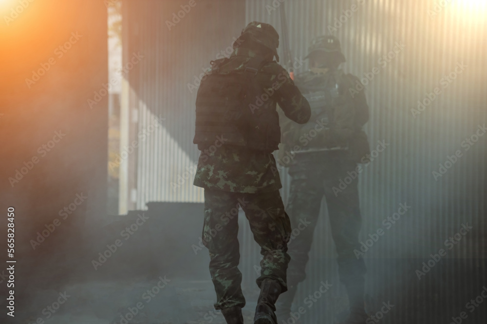 Fototapeta premium soldier in action with rifle