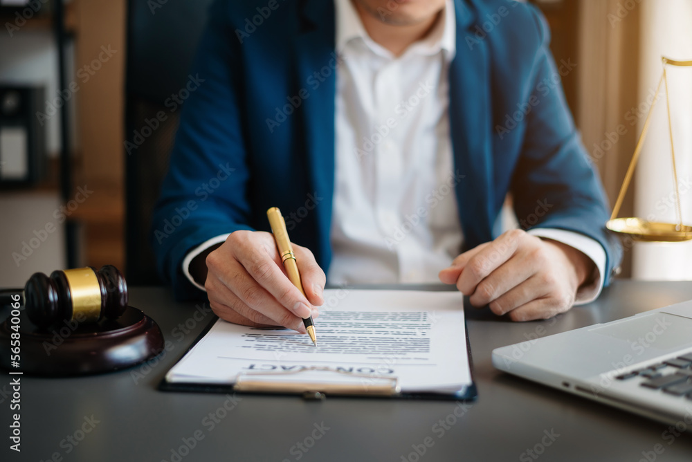 justice and law concept.Male judge in a courtroom on wooden table and Counselor or Male lawyer working in office. . justice and law concept.Male judge in a courtroom on wooden table and Counselor or Male lawyer working in office. .