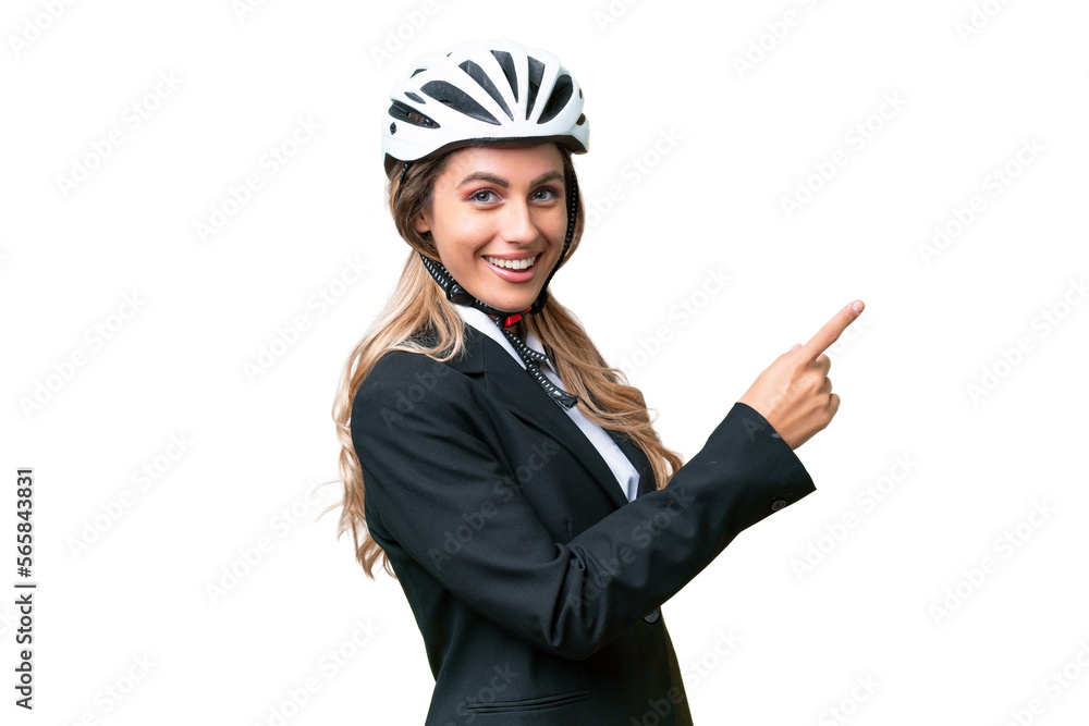 Business Uruguayan woman wearing a helmet biker over isolated background pointing finger to the side Business Uruguayan woman wearing a helmet biker over isolated background pointing finger to the side