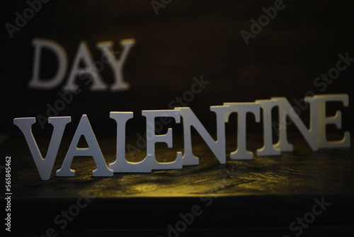 Banner.The word "Valentine's Day". Love on wooden blocks. Theme of love. Wooden letter blocks. Loving, positive emotions. Wooden letters with the word. An exclusive relationship.