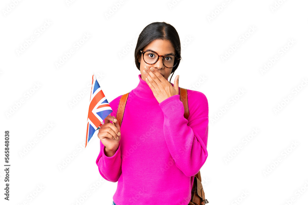 Young African American woman holding an United Kingdom flag over isolated chroma key background happy and smiling covering mouth with hand Young African American woman holding an United Kingdom flag over isolated chroma key background happy and smiling covering mouth with hand