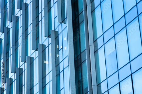 Wallpaper Mural The blue sky is reflected in the windows of a modern office building. Architecture and exterior of contemporary houses Torontodigital.ca