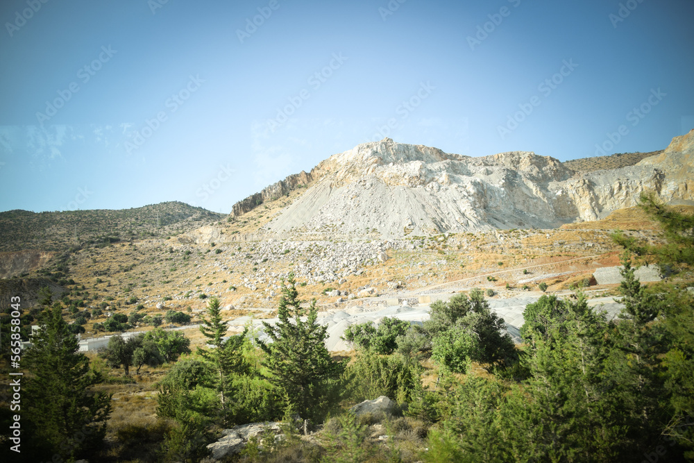 View of the greece nature - high mountain and lakes in valley. Summer nature with green colors.