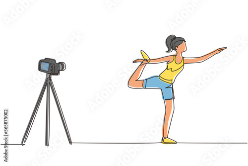 Continuous one line drawing woman blogger in sportswear shoots video on camera doing exercises at home. Fitness vlogger live broadcast of training session. Single line draw design vector illustration