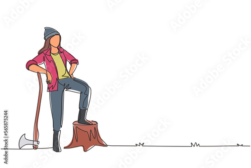Continuous one line drawing beautiful woman lumberjack wearing workwear and beanie hat, standing with axe and posing with one foot on a tree stump. Single line draw design vector graphic illustration