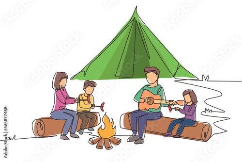Single continuous line drawing hiker family sit by campfire. Tourists, campers. Dad playing guitar, mom and kids fry sausage. Night camping entertainment. One line draw design vector illustration