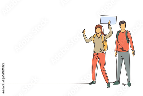 Single one line drawing couple with backpacks standing near road and hitchhiking. Man and woman thumbing or hitching ride. Adventure travel, road trip. Continuous line draw design vector illustration
