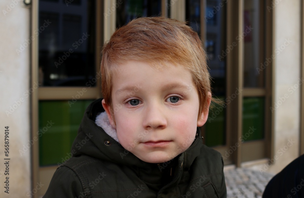 A blond boy with sad eyes. A thoughtful five-year-old boy. A blond boy with sad eyes. A thoughtful five-year-old boy.